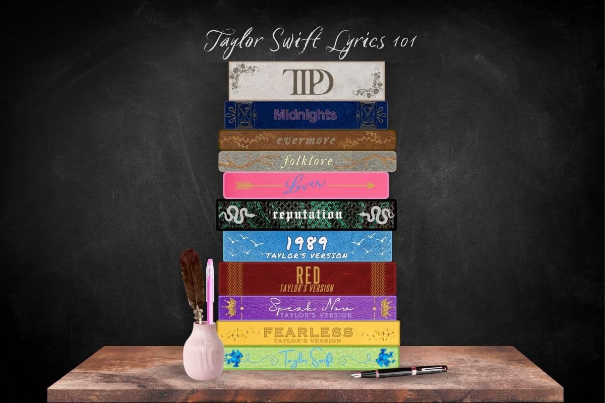 A graphic illustration of a stack of books in front of a chalkboard, each book representing one of Taylor Swift's albums and color-coded. Writing on the blackboard reads "Taylor Swift Lyrics 101" and on the desk lies a pot with a quill pen and glitter gel pen, and next to it a fountain pen, representing each of Taylor's songwriting styles.